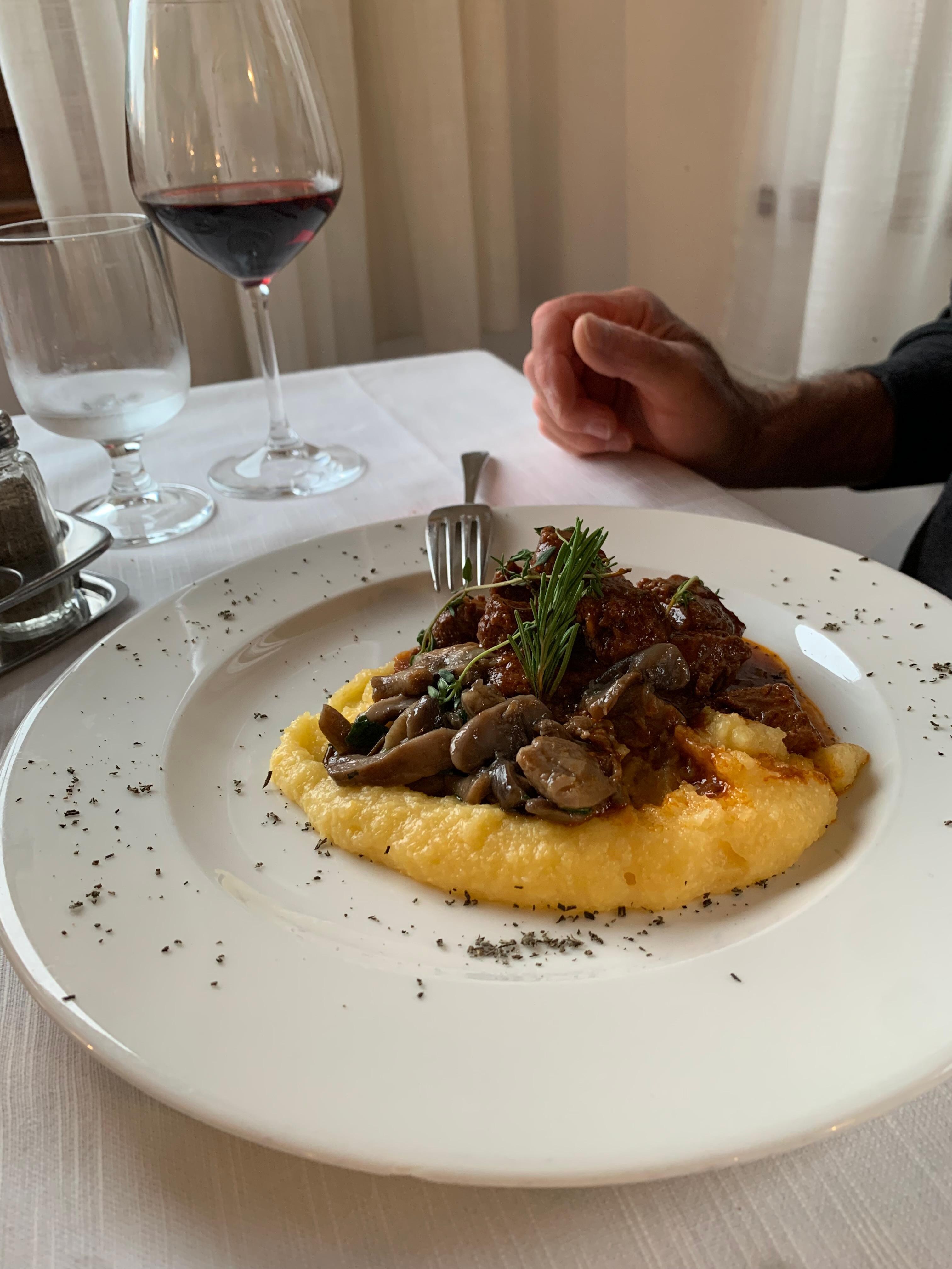 Dinner at the resturant, polenta with mushrooms.