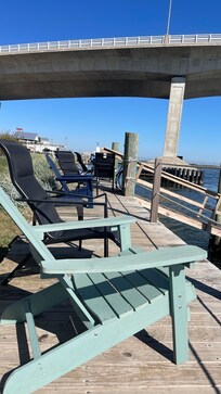 Long communal deck on water