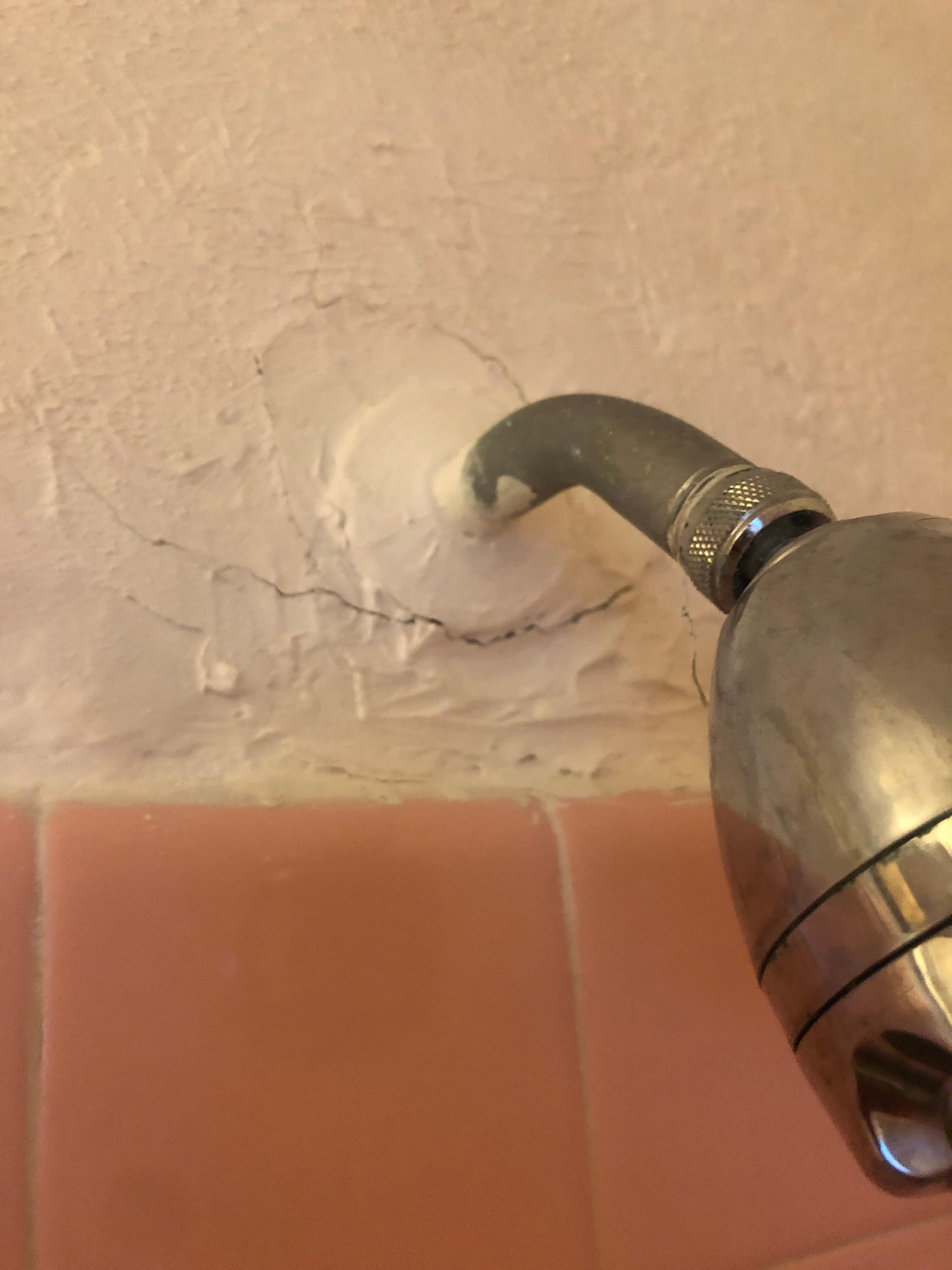 Moves back and fourth from the wall.