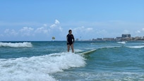 Surfing right outside the condo.
