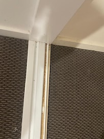 some sort of sticky spillage on bedroom door tracks