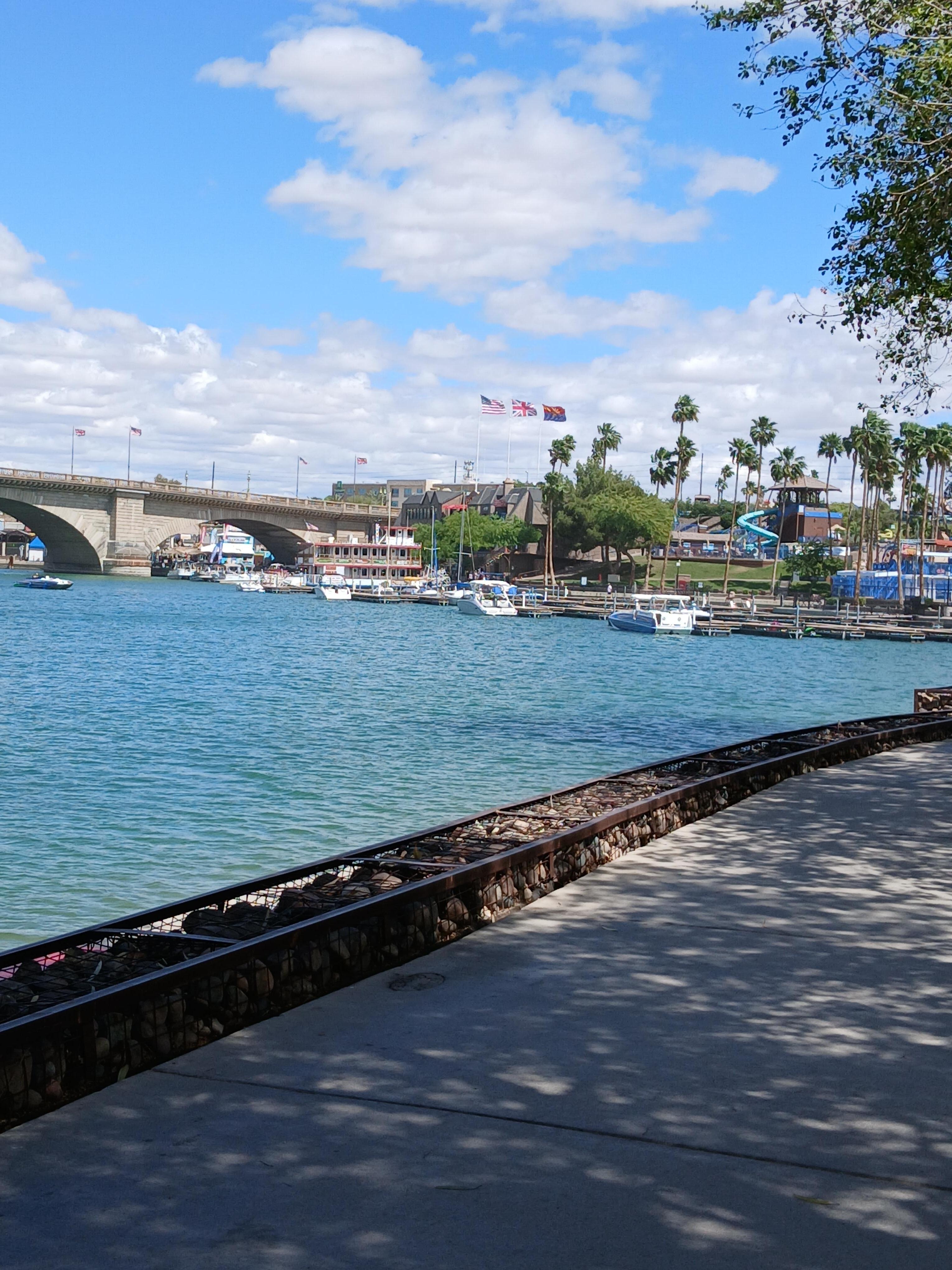 Walk along the channel to the bridge.