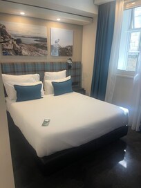 Small and Cozy Standard Room Double Bed. There was also a small desk. Bathroom was nice. Modern. Good Shower. Just what we needed to sleep and get ready for our sightseeing.