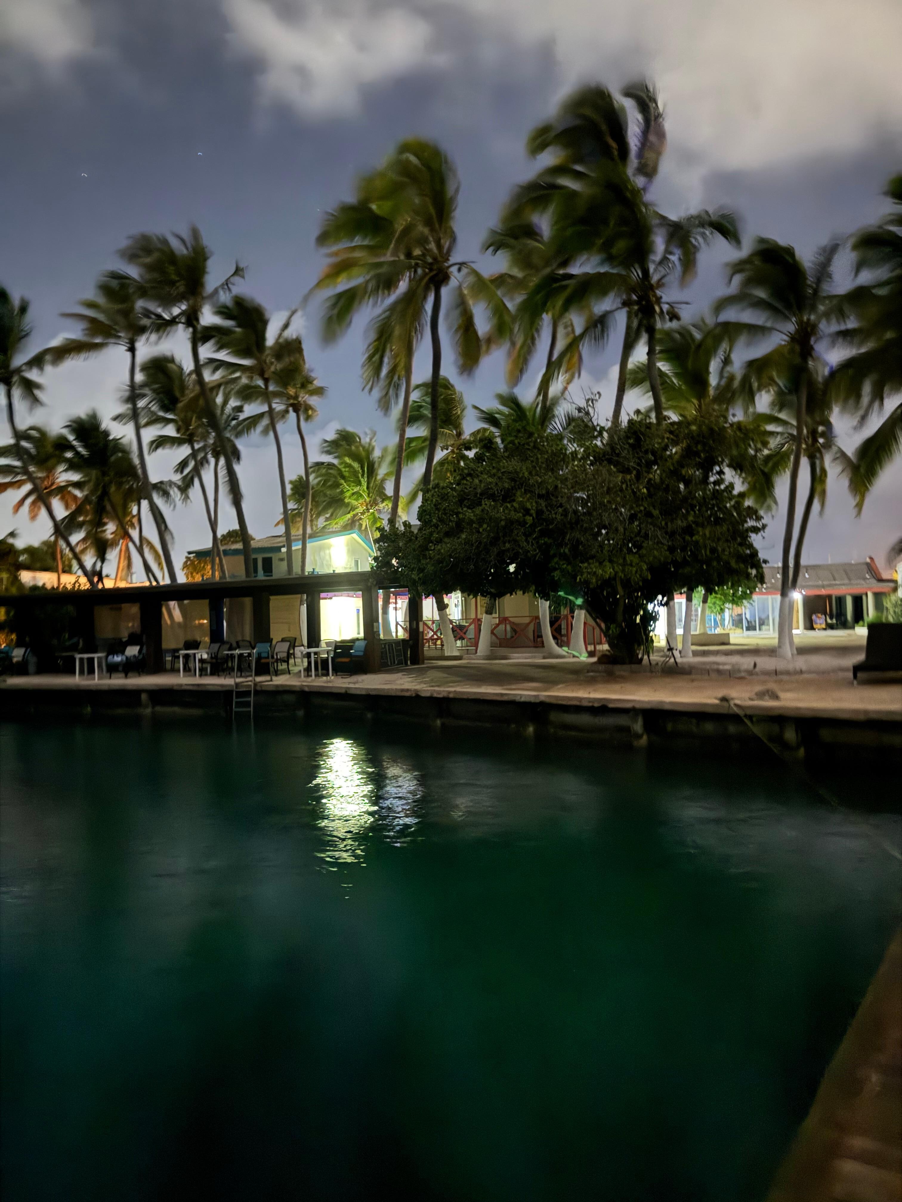 View of property at night from the floating massage deck