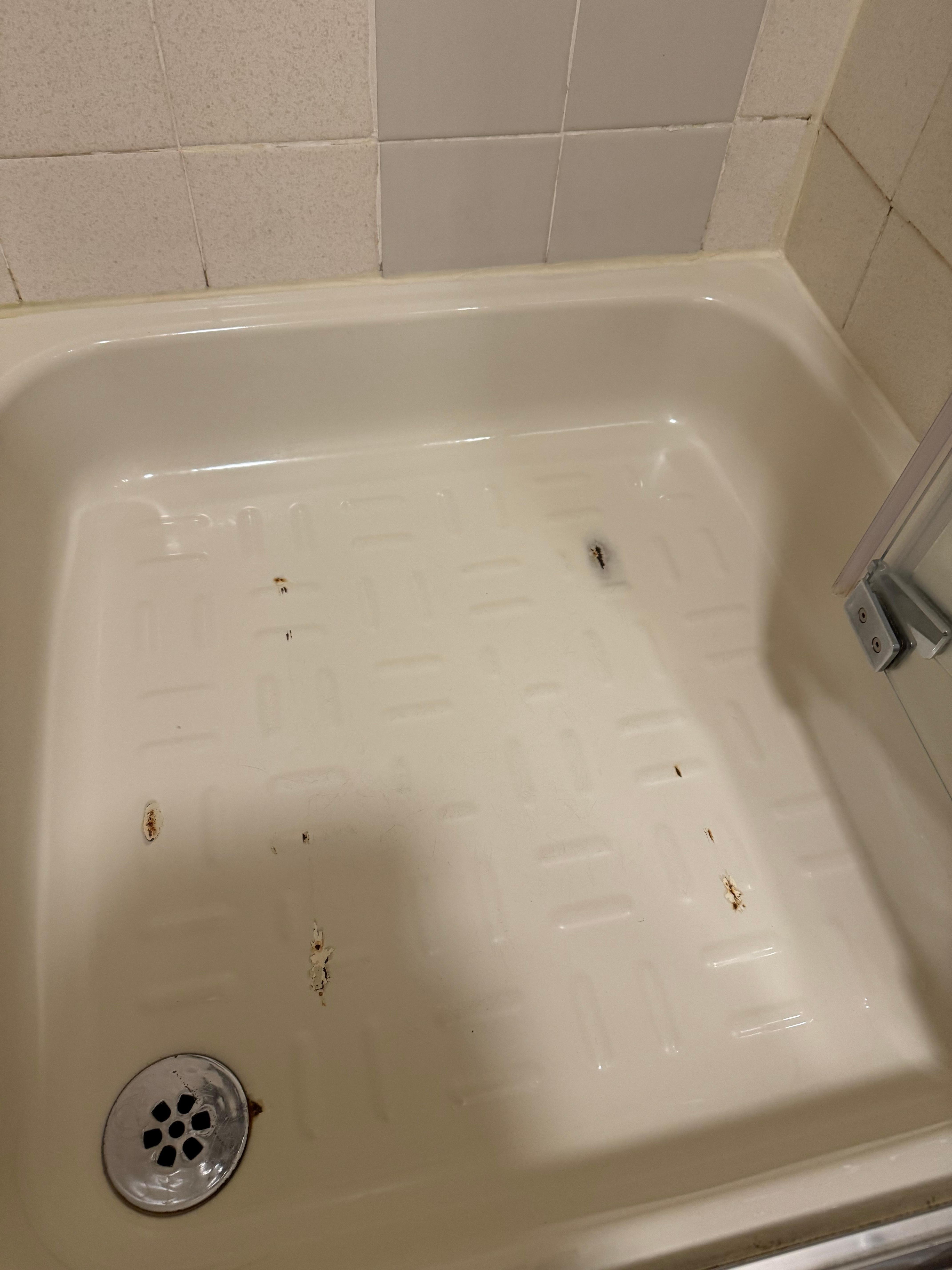 Rust in base of shower