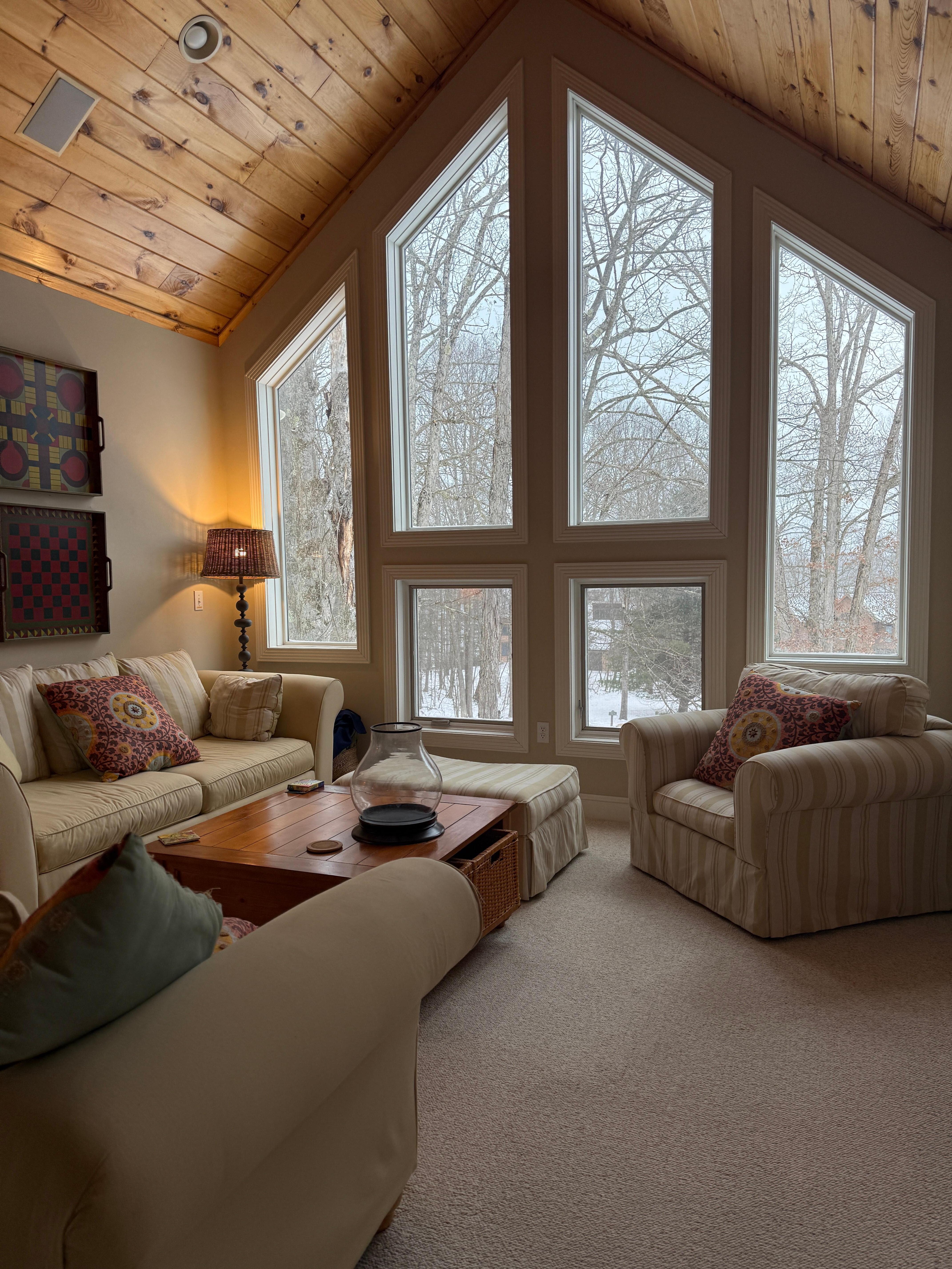 The loft was a charming space with a cabinet full of books