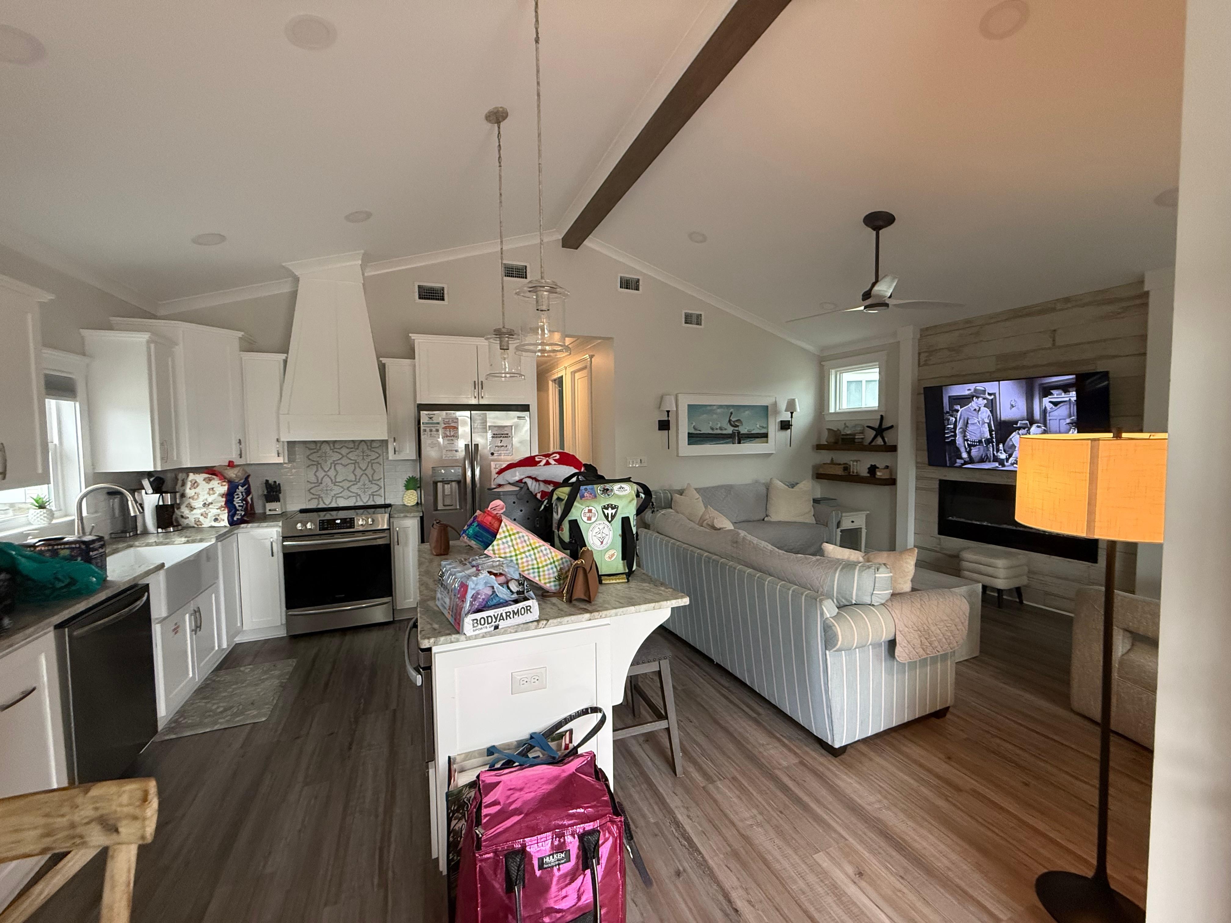 Excuse all of our stuff, living room/kitchen/dining