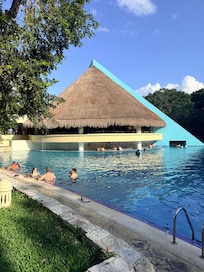 Pool with swim up bar