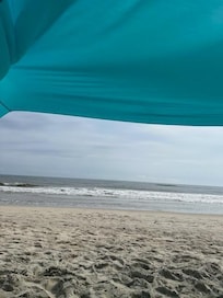 Sitting on the beach after the short walk from the house.
