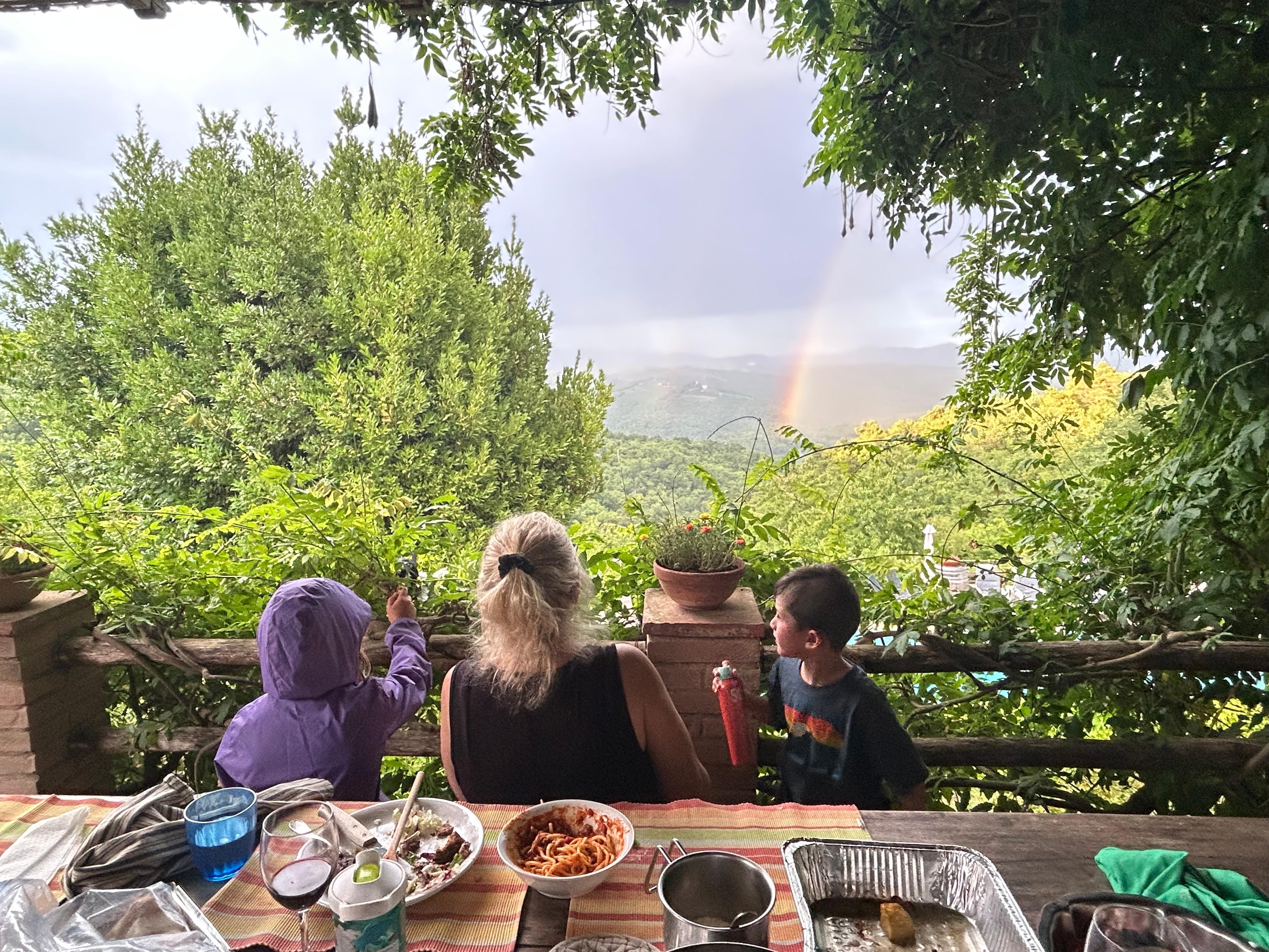 From the lower terrace watching the rainbow during dinner