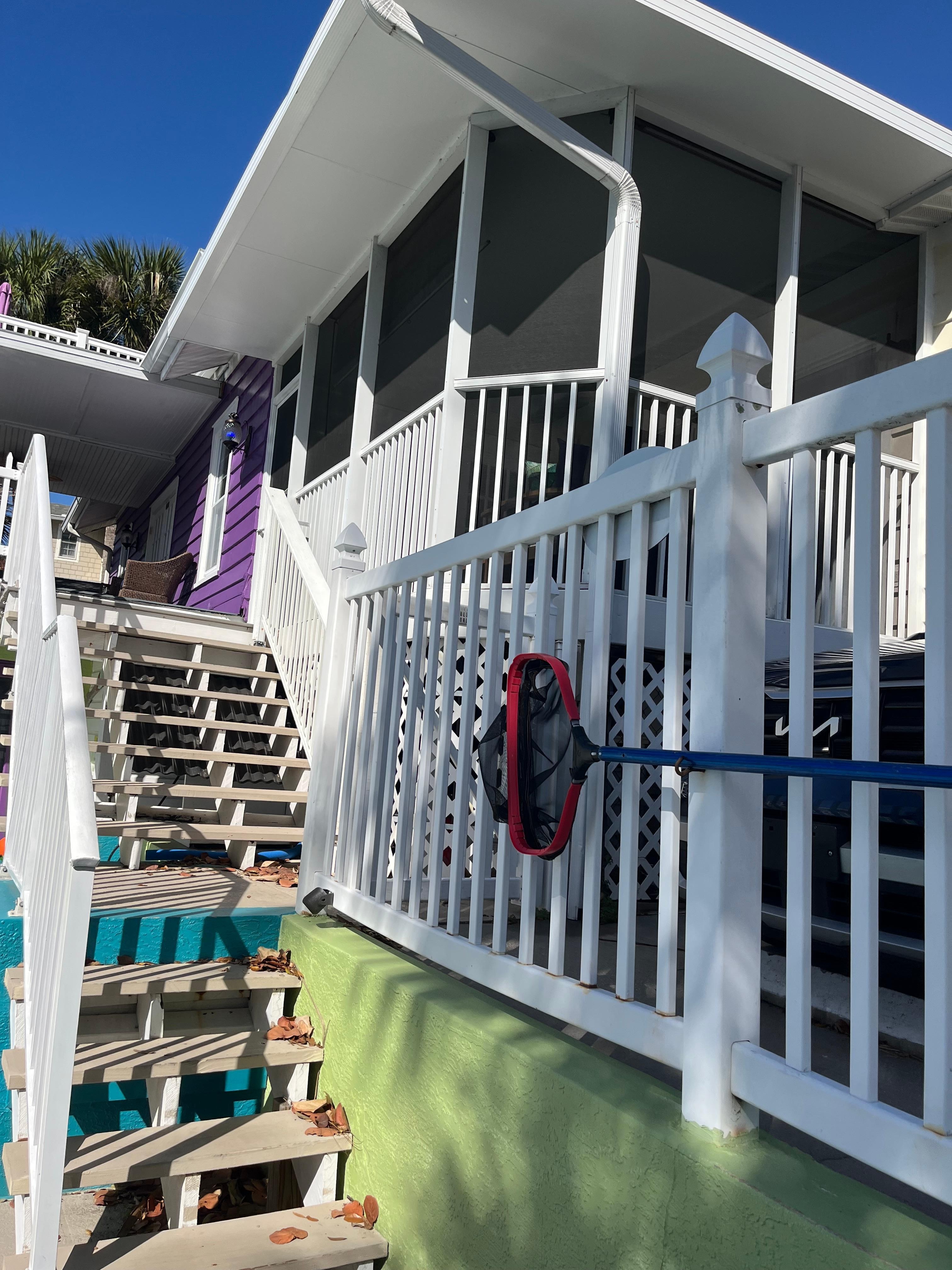 Back stairs going up to our room/screened in porch. There’s another (private) entrance to the room in the front of the house at street level. 