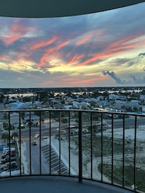 Both photos are from the master bedroom balcony facing the city. Sunrise.