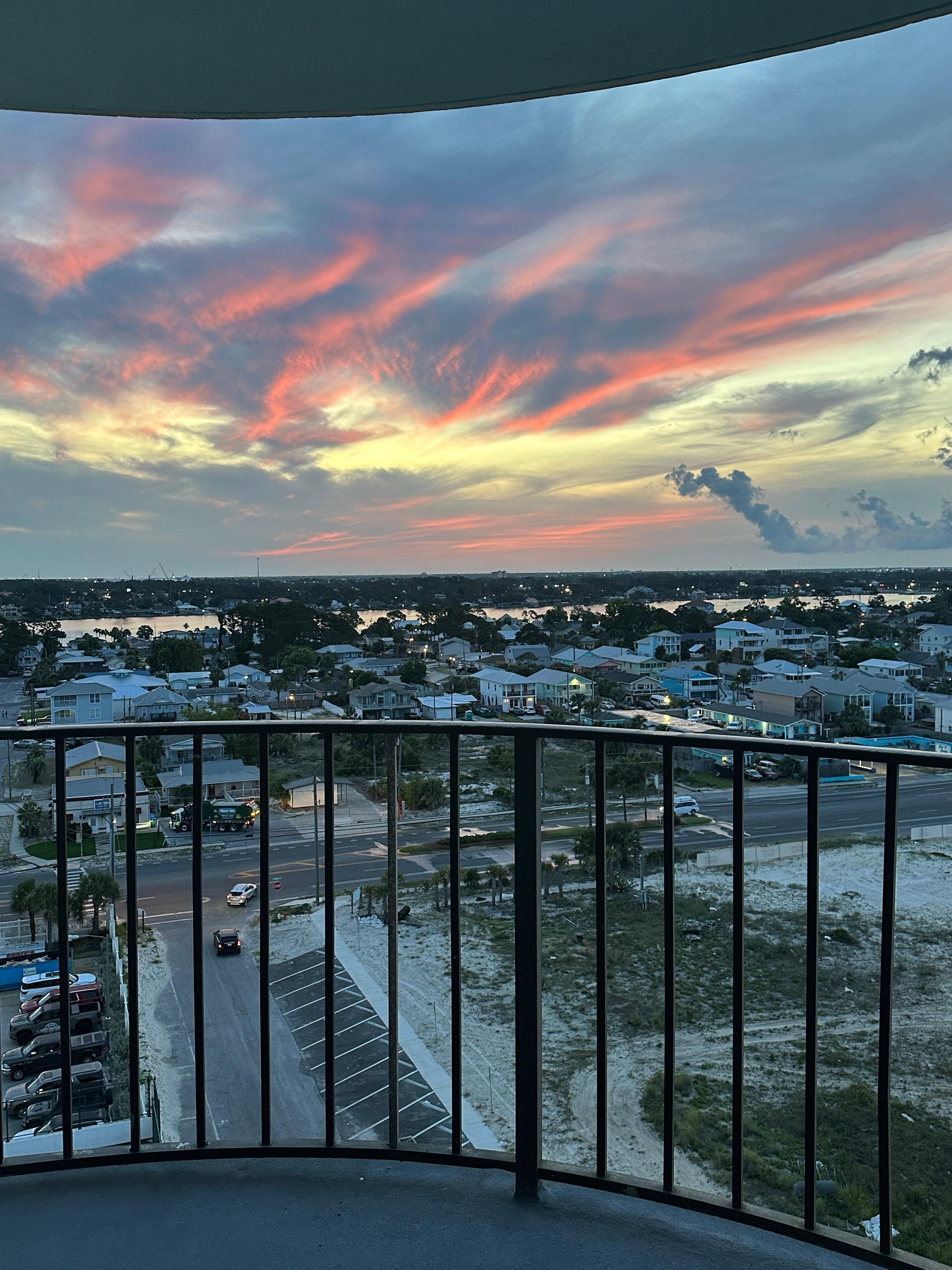 Both photos are from the master bedroom balcony facing the city. Sunrise.