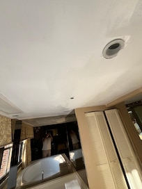Ceiling above tub, fixed leak but not painted