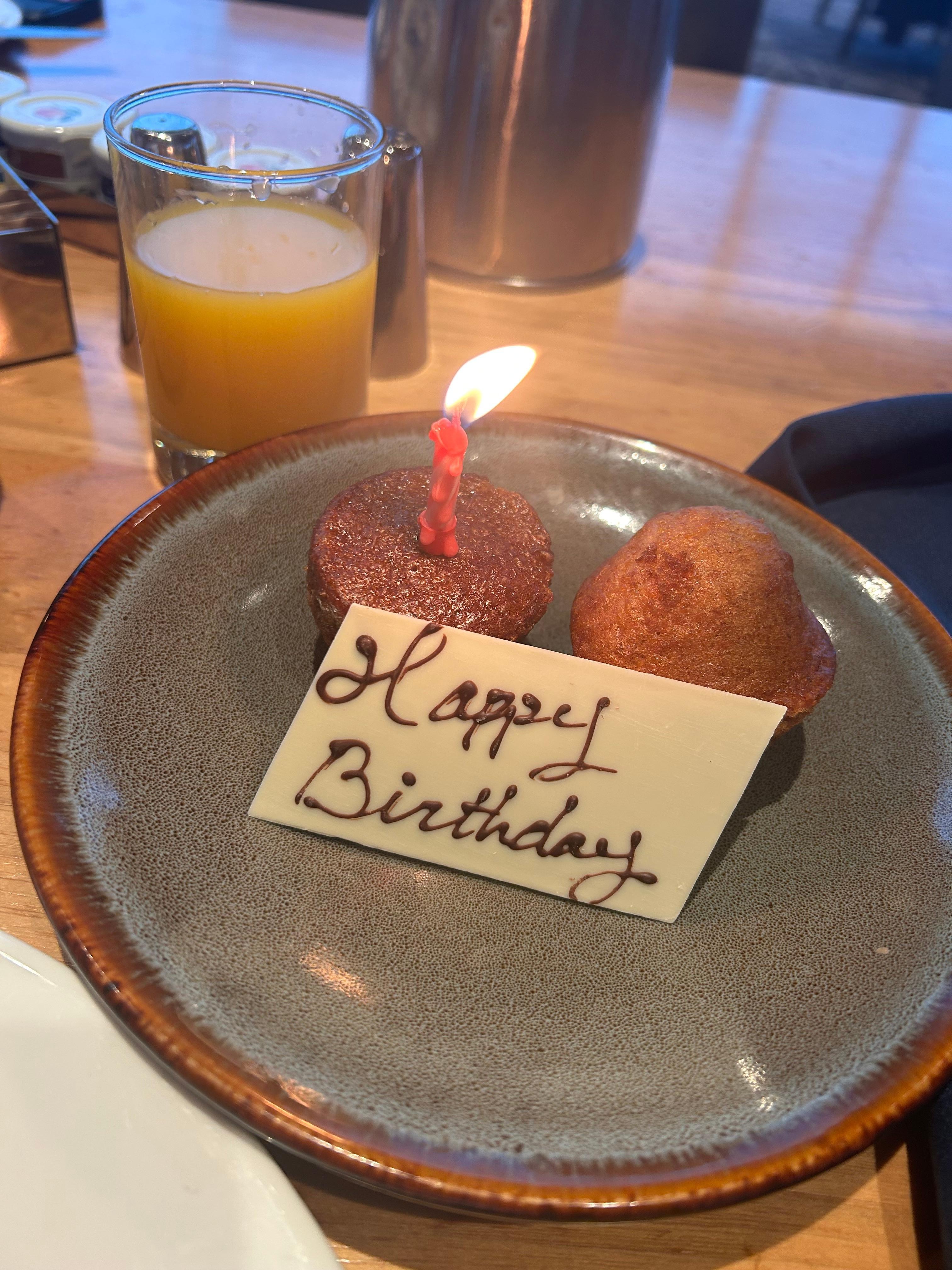 We got the buffet breakfast , since it was my birthday . Our waiter apologized that there wasn't birthday cake at breakfast time ; but then he showed up with the little muffins with a birthday wish and candle ! How charming 