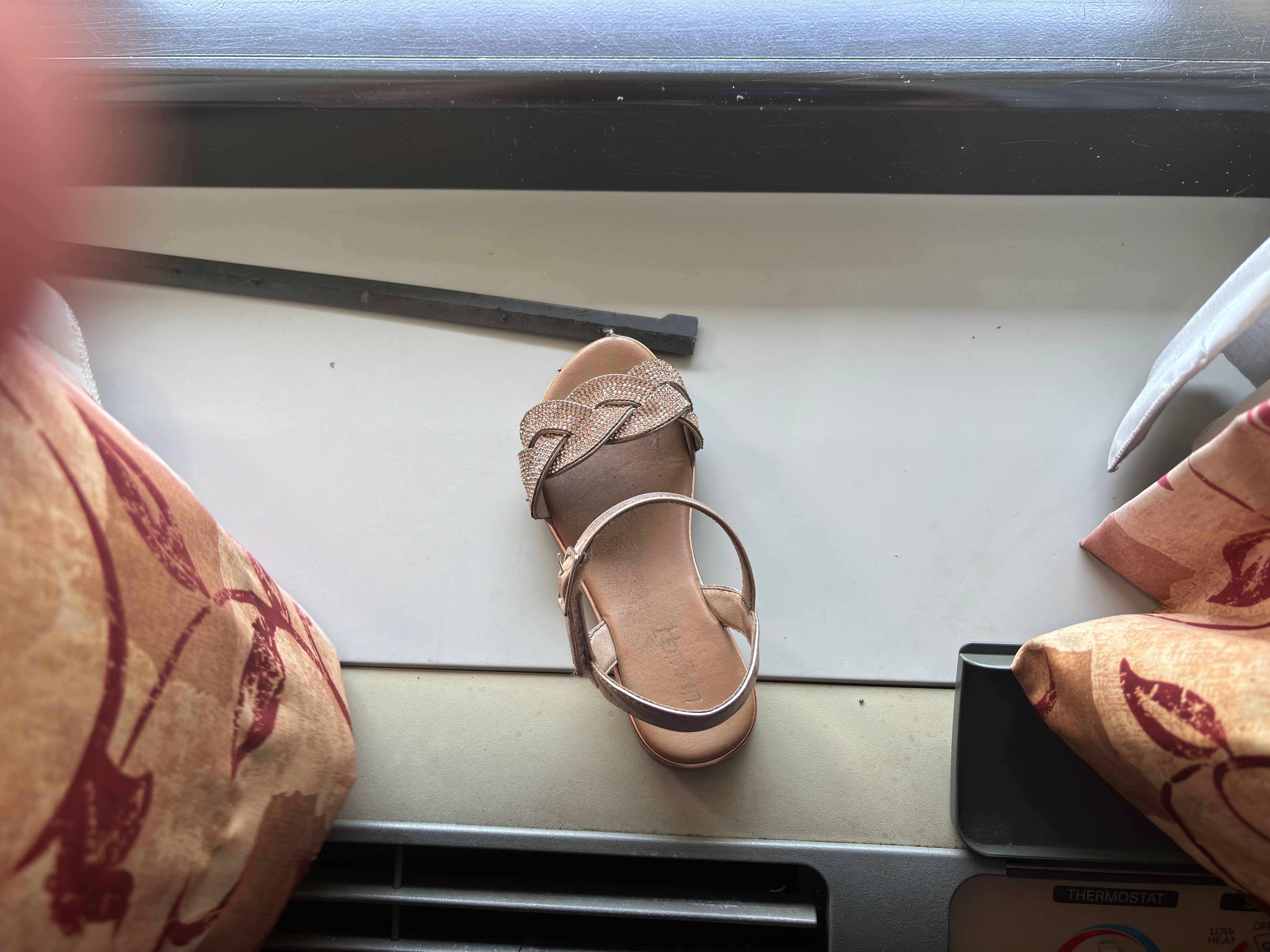 Shoe found under A/C unit