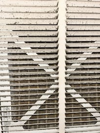 Large duct vent on the way up the stairs.