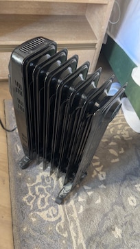 portable heater that caused said power outage so that we were freezing in the dark of our “upgraded room”