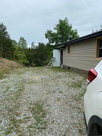 Here's the storeroom door I had to prop open to try to air out the house from the dead animal smell.