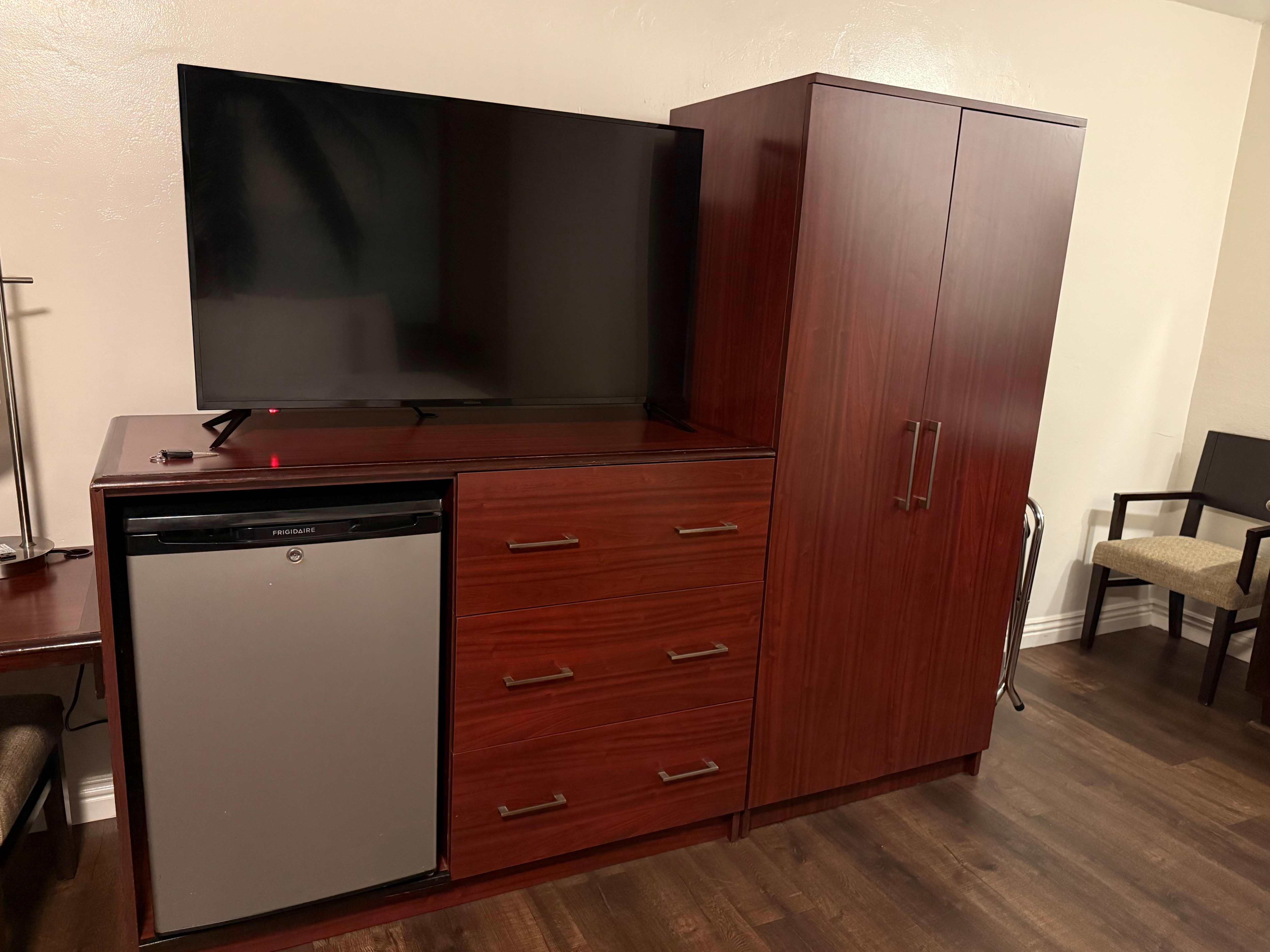 Closet, tv and refrigerator 