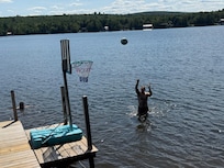 We bought a hoop which was a hit all week on the dock .