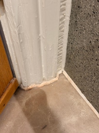 By the bathroom door