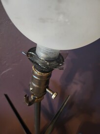 Broken globe in master; still in use. Nearly cut my finger off.