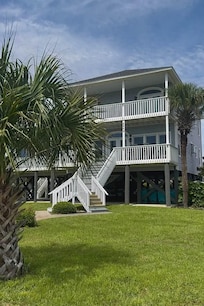 2 nice decks-- one with chairs and one with high top tables and chairs. Also, high top tables and chairs just outside the fenced pool area.