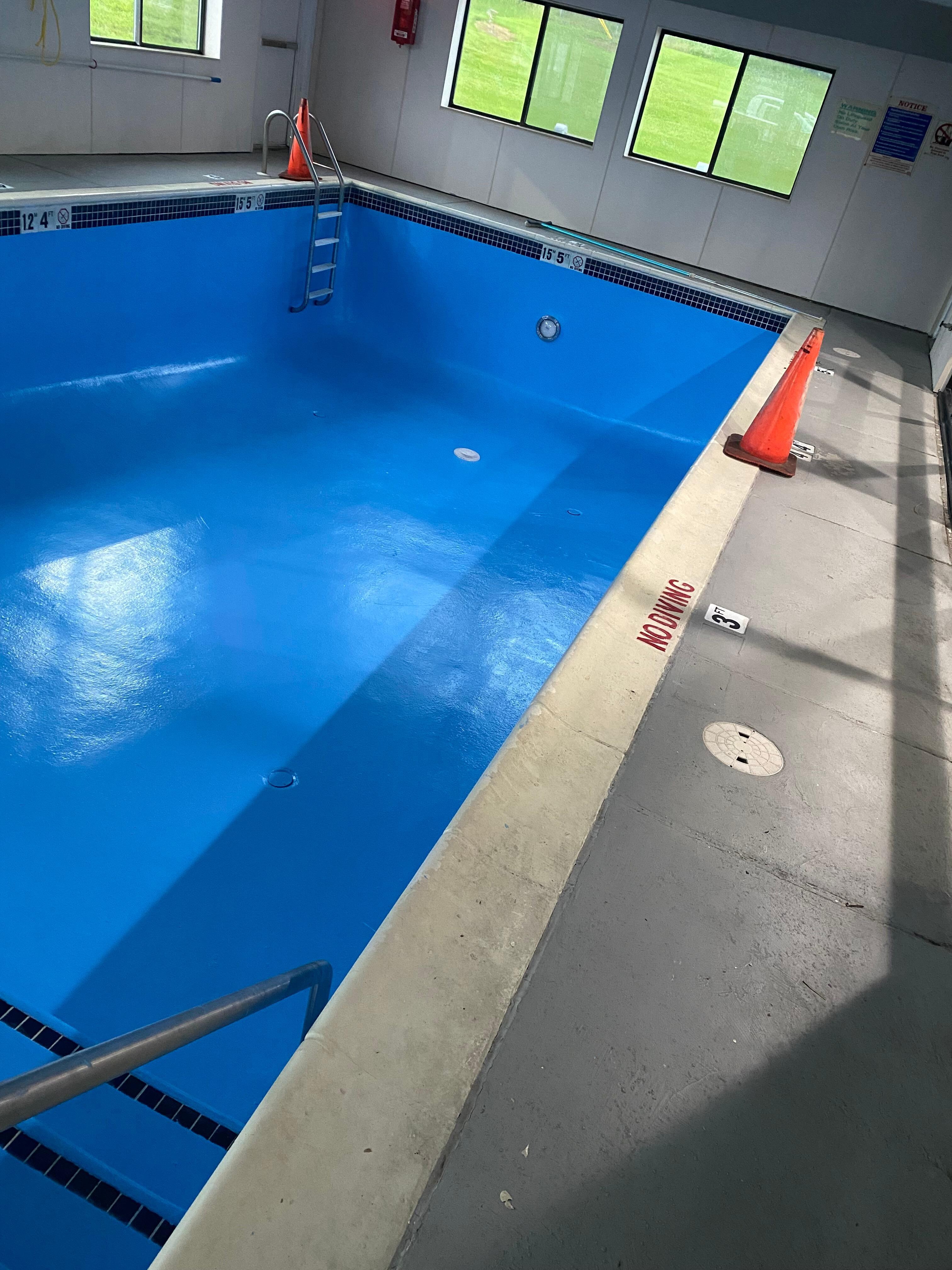 The pool was drained about 3-4 weeks ago and it was just repainted about a week or so ago. 