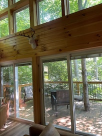 Incredible windows and light surround you with nature.
There's allowance for a tree to grow through the second story deck bringing nature close which was awesome.