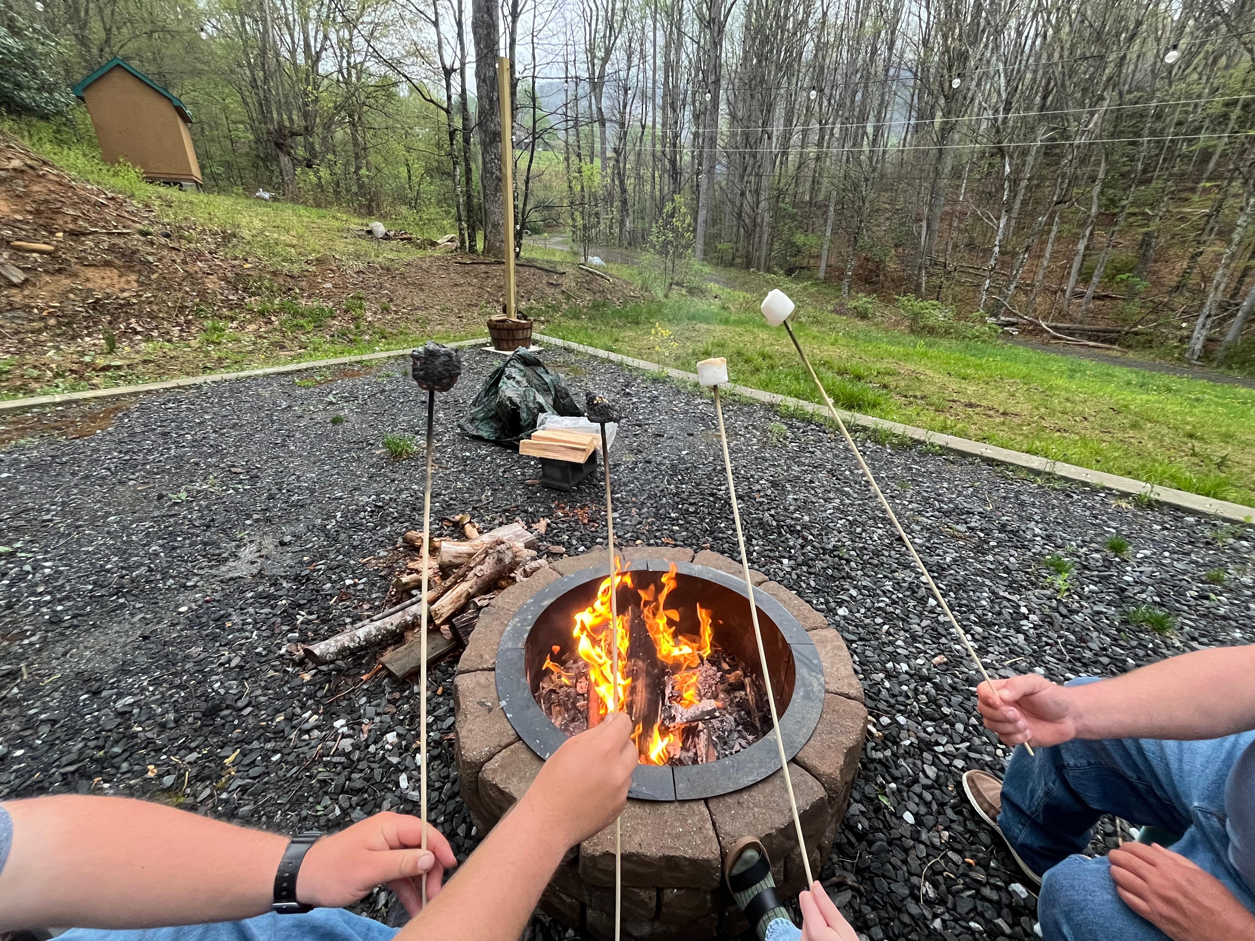 Fire pit, roasting marshmallows.