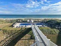 View of the pool and beach from one of the decks