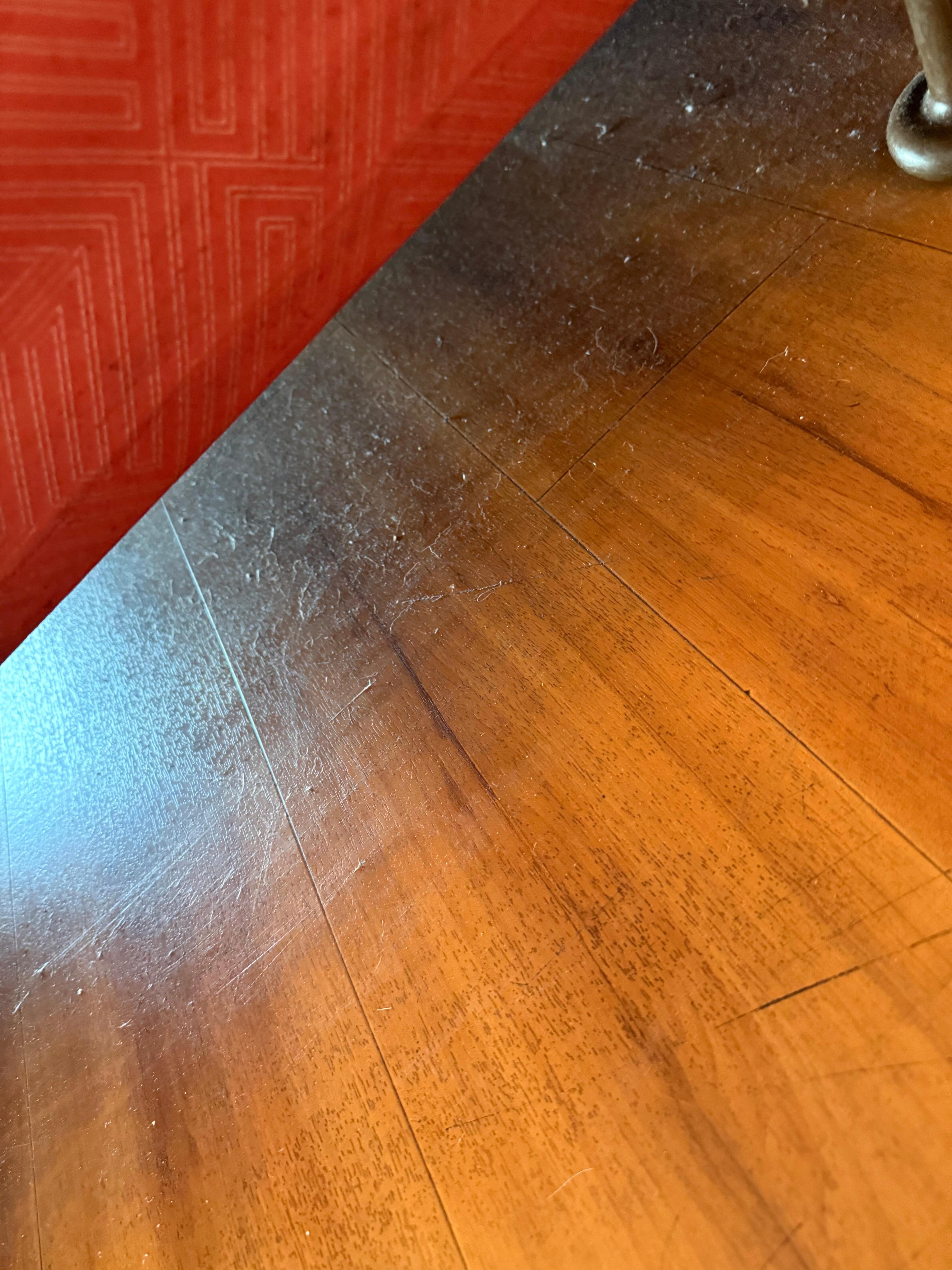 The floor had dirty foot prints from someone’s shoes 