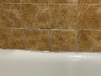 Tile coming apart