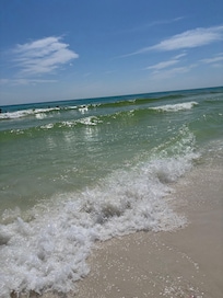 Beautiful clean beach was just a few steps across the side road to the private beach entrance.