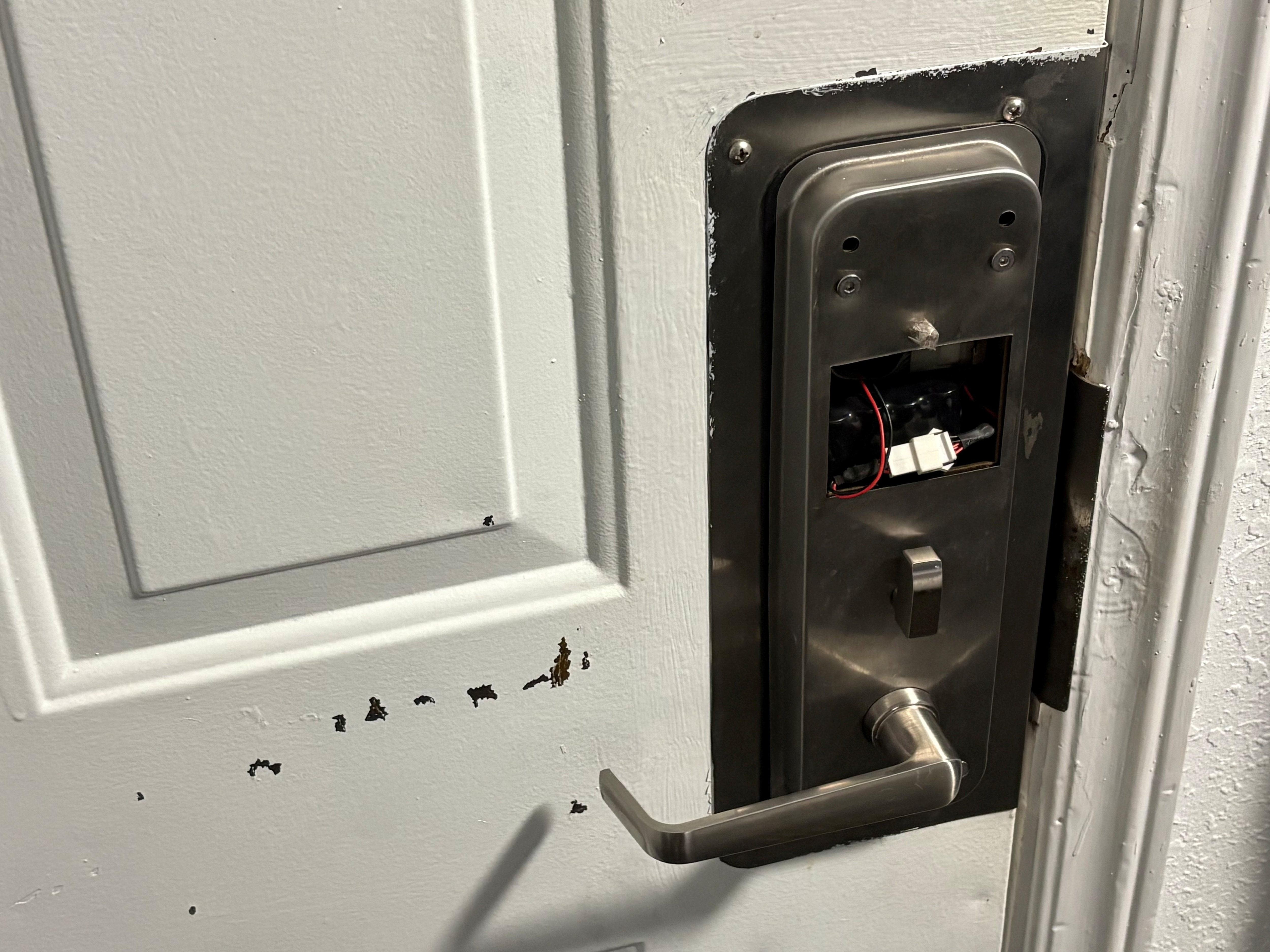 More exposed wiring in the door