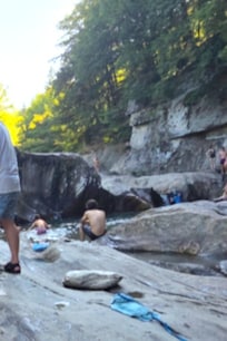 Warren Falls, great deep pool for soaking in the river, rocks for jumping.
Requires sure footing to walk across stream to get to sitting rocks
