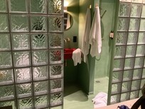 Open shower floods room