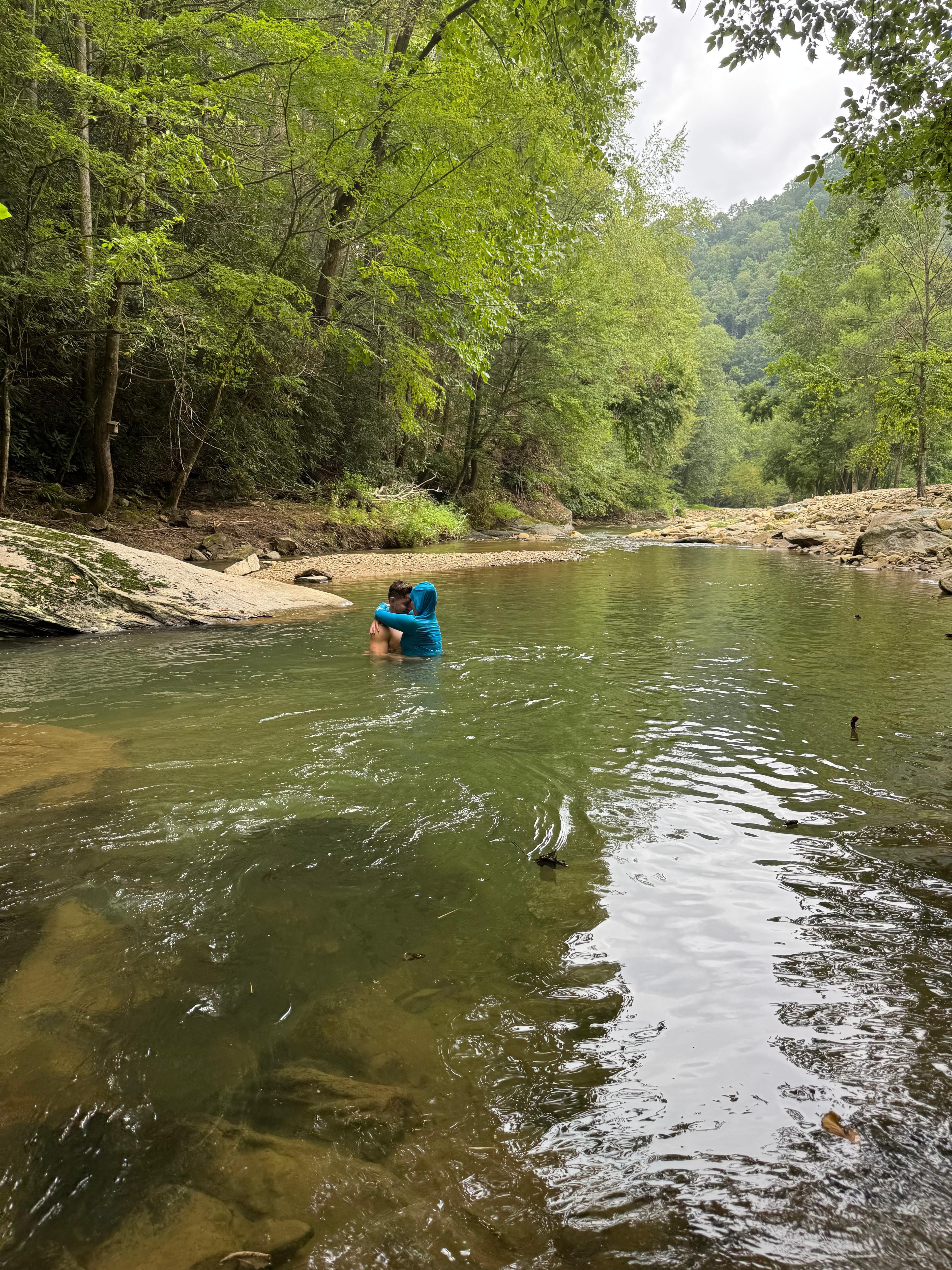 Lizzie and Steven's romantic creek photo