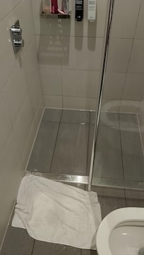 Really badly designed shower floods the bathroom and smells of urine for hours afterwards.