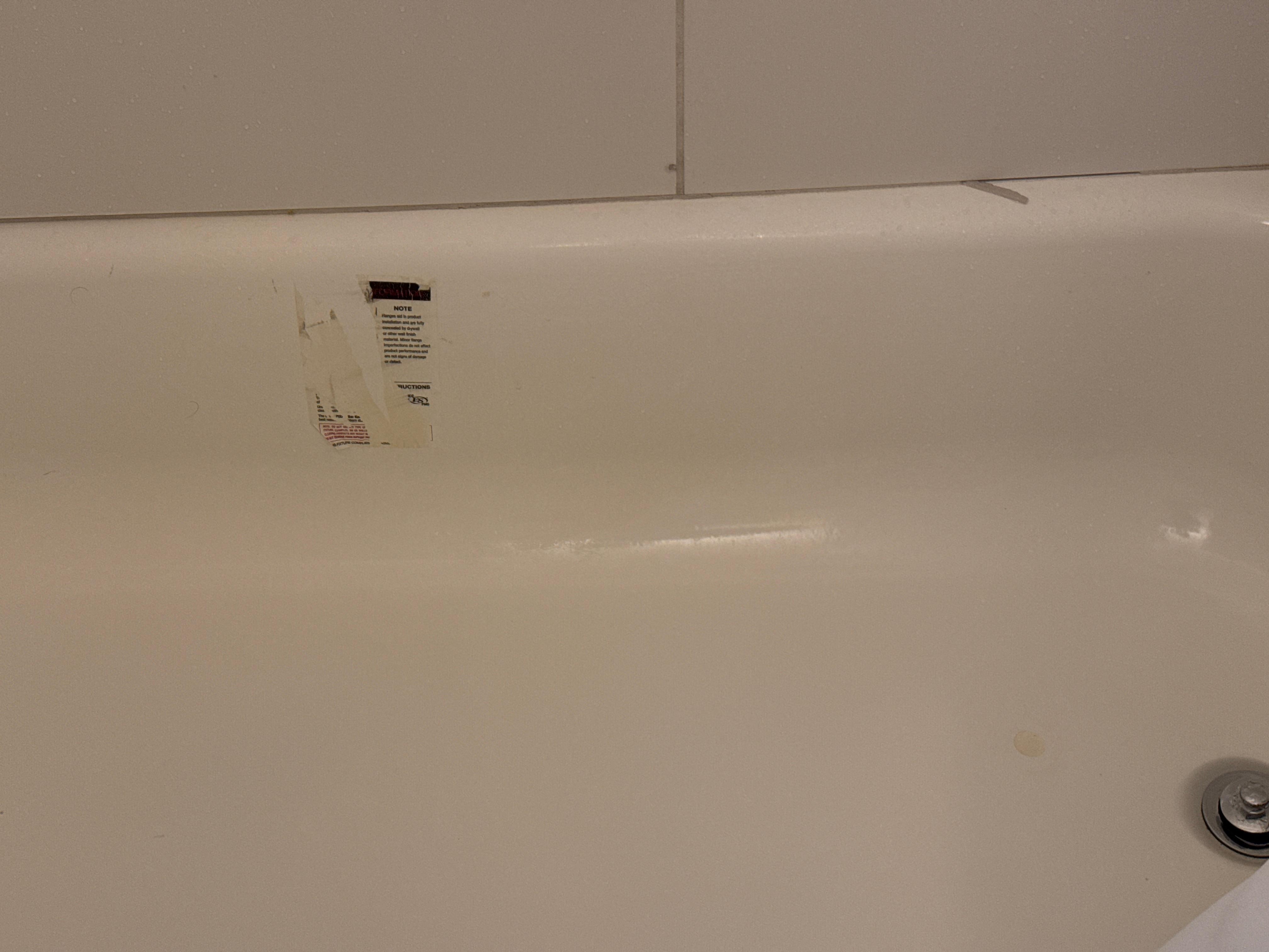 Looks like these thicker on the tub was never removed