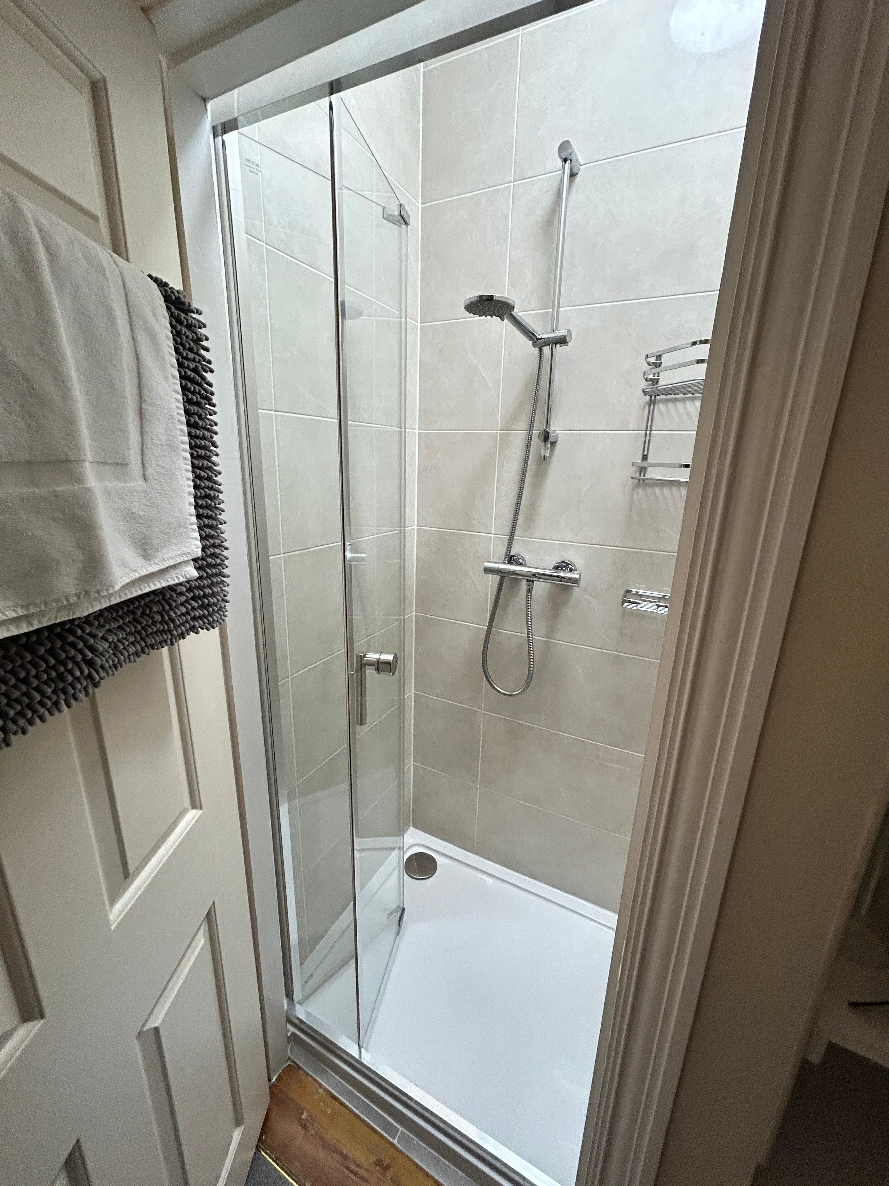 Open another cupboard, it’s the shower. And yes, there is a cupboard to put stuff in as well