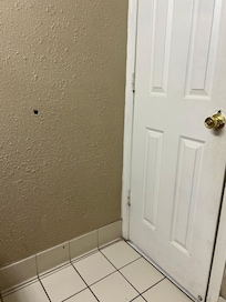 Holes in the bathroom wall