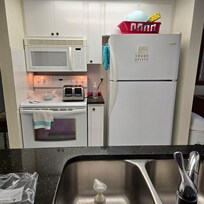 Very Small Kitchen, things were stored in dining room