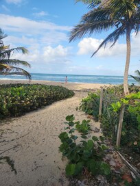 This is the path to the beach from condo.. but it's not safe to swim here. You have to go to the adjacent beach Marchiquita beach to swim. Grocery store & walmart close. Couple little restaurants/bars within a few minutes.