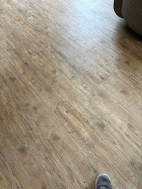 Numerous scratches in the floor.