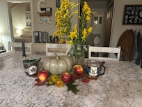 Made a fall centerpiece w leaves from a hike and wildflowers.