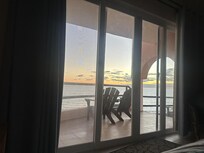 View of sunrise from bed in master bedroom