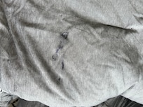 Sticky, wet mark on the comforter