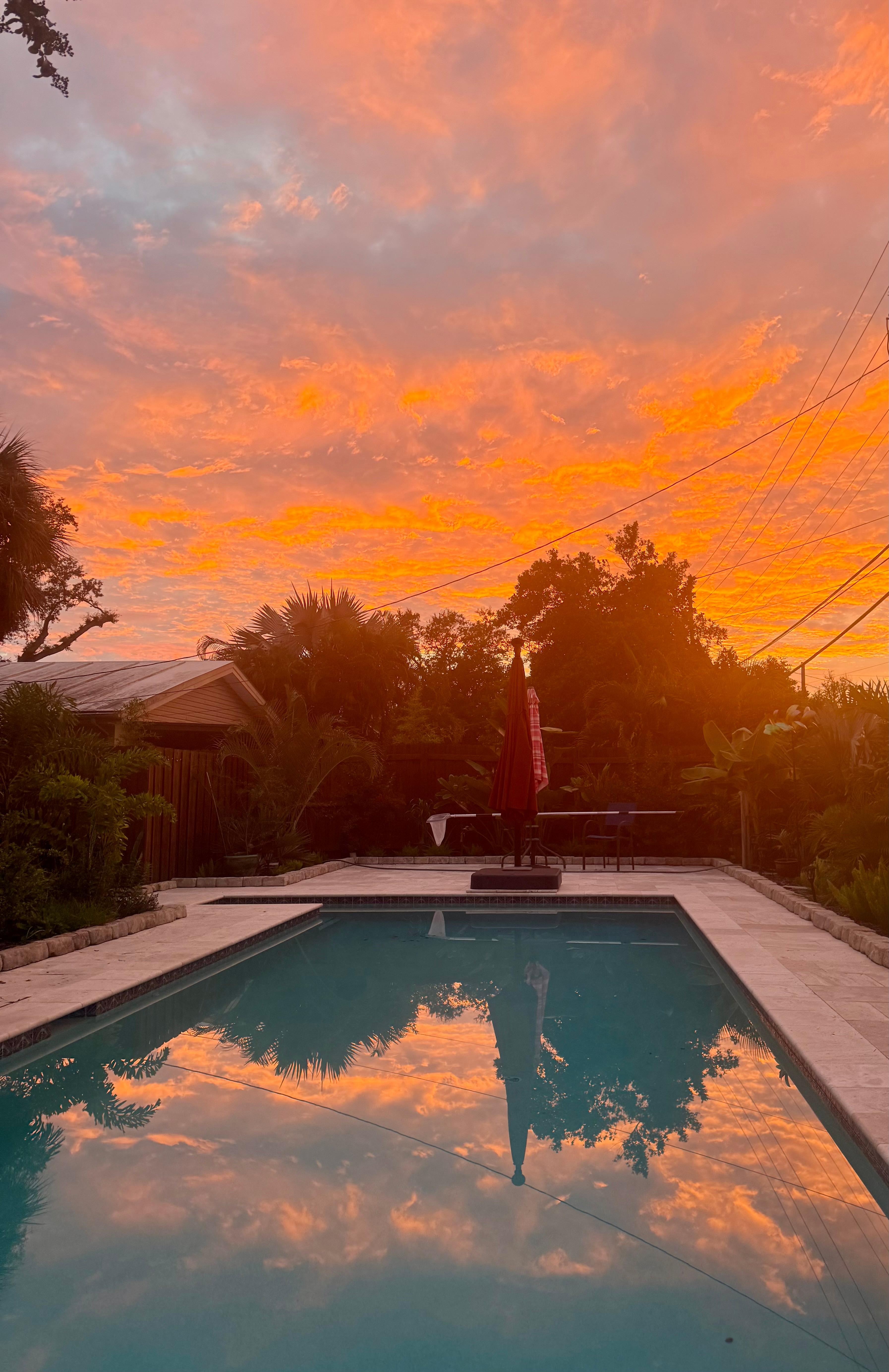 Enjoying a spectacular sunset by the pool.